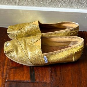 TOMS gold sequin canvas slip ons, size W7